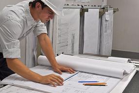Engineer at drafting table